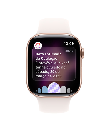 Apple Watch Series 11 com caixa cor de ouro rosa de alumínio, pulseira esportiva blush-clara e lateral direita com Digital Crown, notificação de data estimada da ovulação.