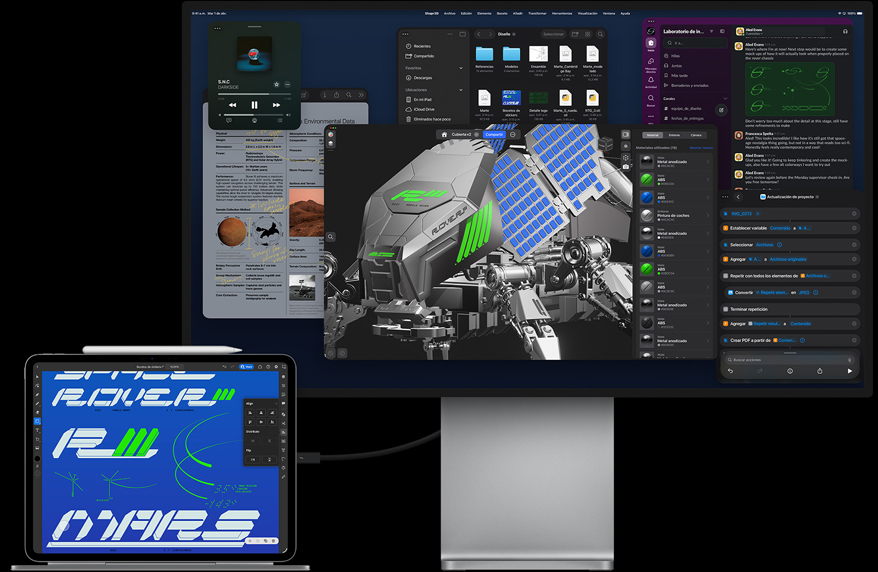 iPad Pro conectado a un Magic Keyboard, parte frontal, ambos conectados a un monitor Mac Studio Display externo, la pantalla del iPad Pro muestra una app de diseño gráfico, colores vibrantes y texto, el monitor Studio Display muestra varias apps y un modelo en 3D