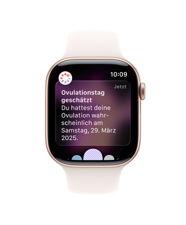 Apple Watch Series 11, Aluminiumgehäuse, Farbe Roségold, Mitteilung zum geschätzten Ovulationstag, rechte Seitenansicht: Digital Crown, Sportarmband Blassrosa