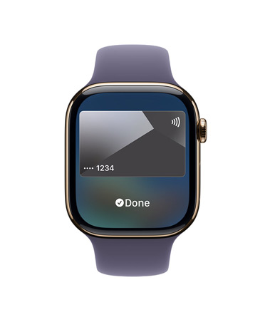 Apple Watch Series 11 med urkasse i guldfarvet titanium, Apple Pay, Digital Crown i højre side, Sportsrem i sart lilla