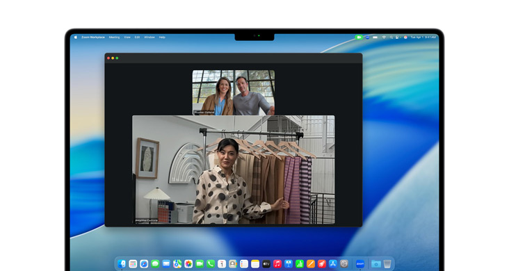 16" MacBook Pro med Mail og iPhone-skærmdublering af Uber Eats-appen på skærmen.
