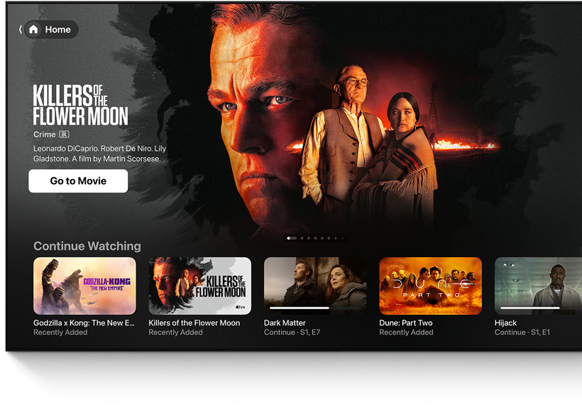 Az Apple TV app kezdőképernyőjének felülete egy síkképernyős tévén