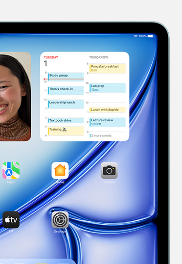 Multiple widgets and apps displayed on a screen, including Photos, Calendar, Maps, Home, Camera, TV and Settings.