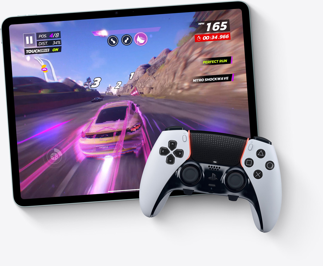 iPad Air, landscape orientation, screen displays video game Asphalt Legends Unite, Playstation controller