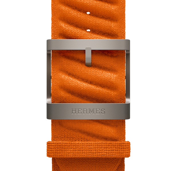 Bracelet En Mer Apple Watch Hermès Ultra 3, orange, attache coloris naturel, logo Hermès gravé sur la boucle