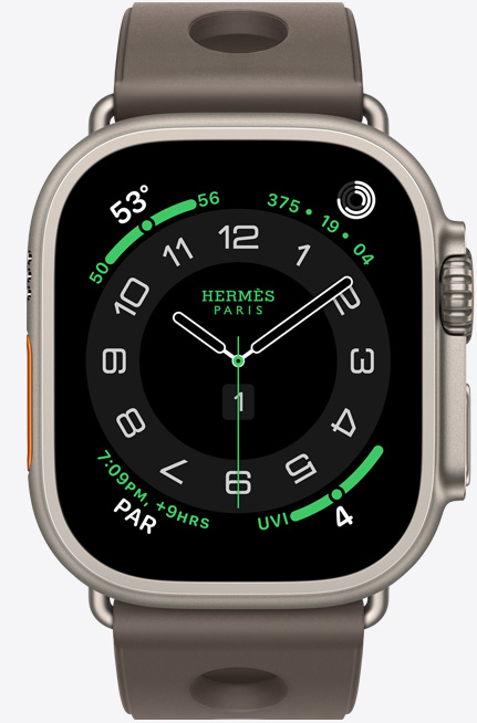 Apple Watch Hermès Ultra 3, titanboett, naturlig finish, urtavlan Hermès Circulaire, komplikationer: väder, aktivitetsringar, PAR, UV-index, höger utsida, Digital Crown, mikrofon, upphöjd sidoknapp, armband Scub'H Diving i färgen Gris Titane