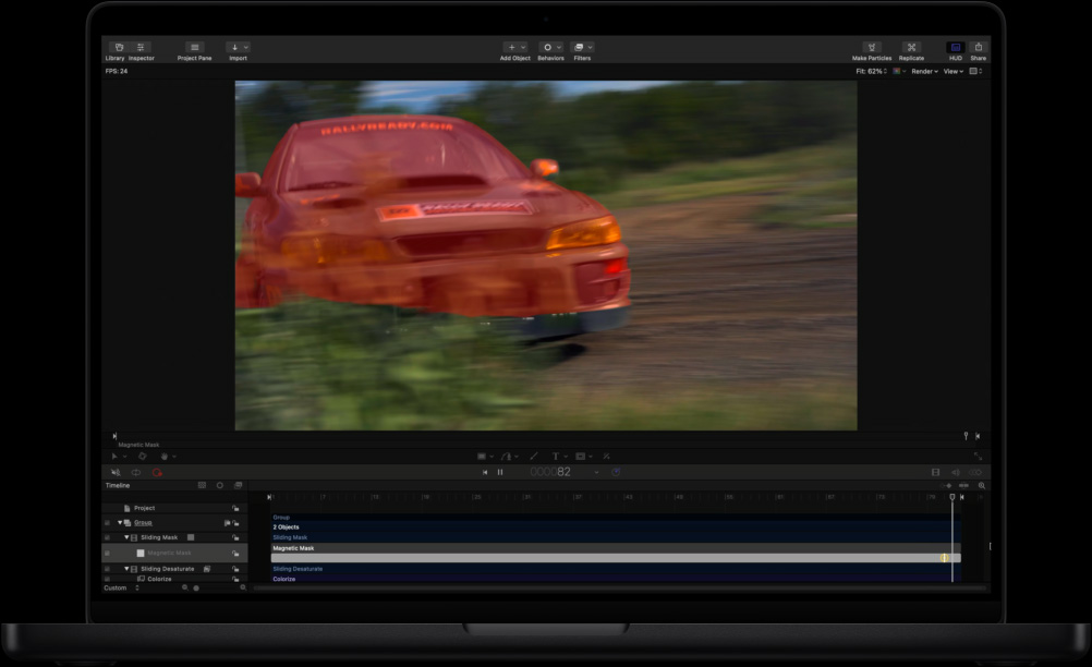 MacBook Pro 16, screen showing Motion workspace with a green car driving through a field, a red mask overlay