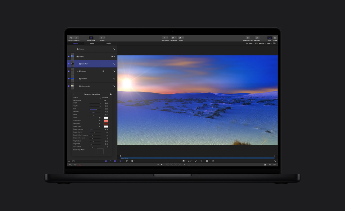 MacBook Pro 16, wide shot of a snow-covered landscape with lens flare demonstration