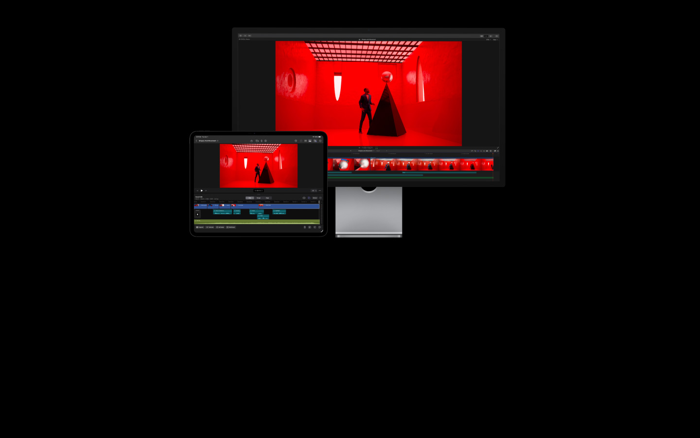 Final Cut Pro edit in progress, a man in a blue suit in a red room placing a giant white pearl atop a black pyramid
