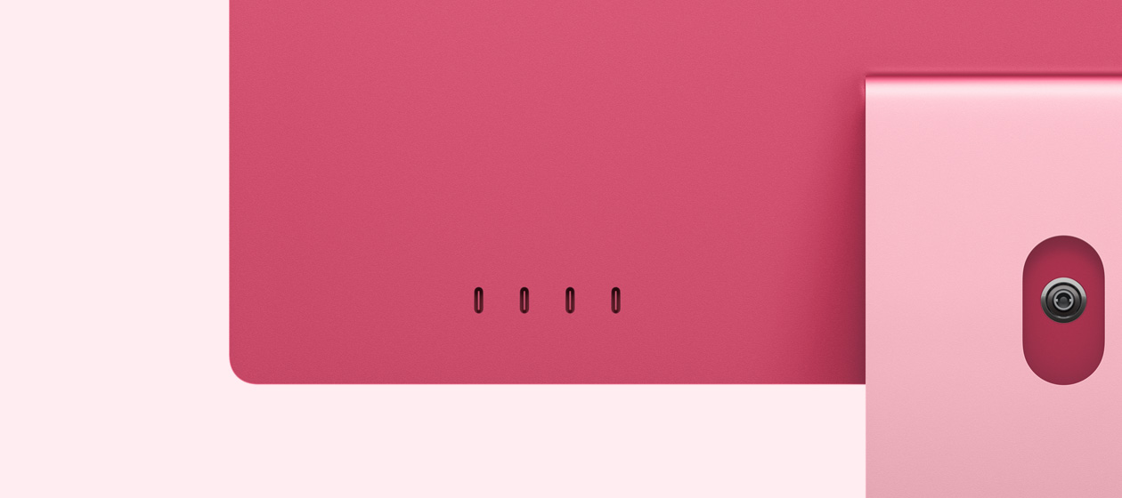 Stražnji prikaz ružičastog iMaca s prikazom 4 priključka USB‑C