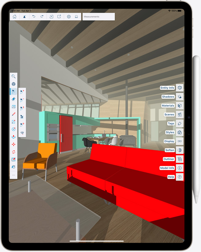 Vertikāli novietots iPad Air ar pievienotu Apple Pencil, ekrānā ir krāsaina bilde
