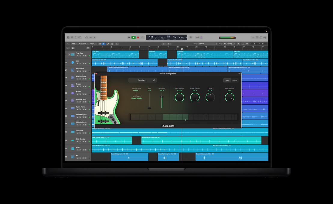 Pantalla de una MacBook Pro de 16 pulgadas que muestra una ventana de Studio Bass, Groove: Vintage Tone, con una guitarra eléctrica verde a la izquierda, y controles de la sesión principal